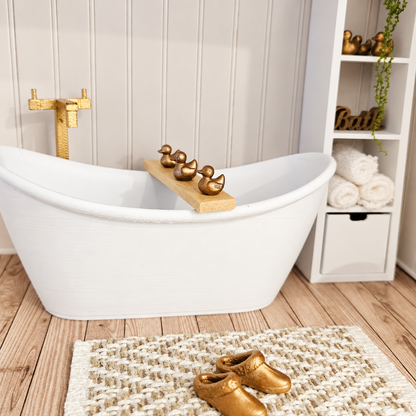 Wooden 1:12 scale dolls house bath board with three gold ducks displayed across a white bath